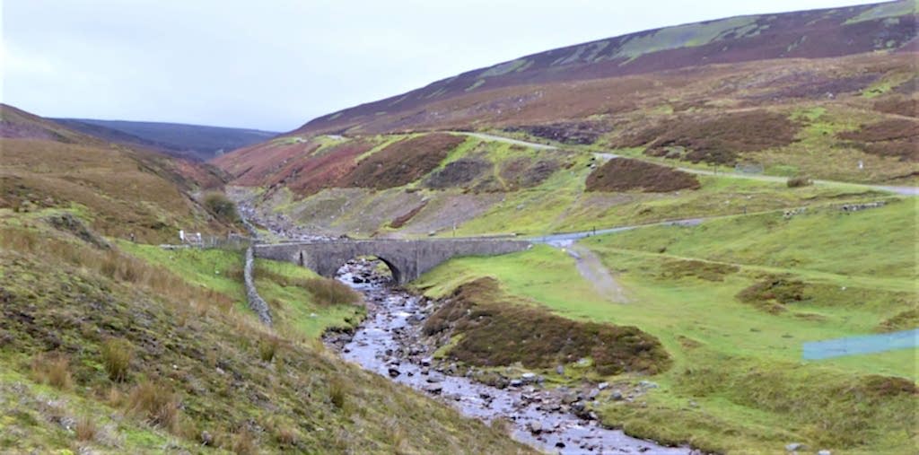 The image shows Surrender Bridge in Swaledale in the Yorkshire Dales which was a major filming spot in Wuthering Heights.