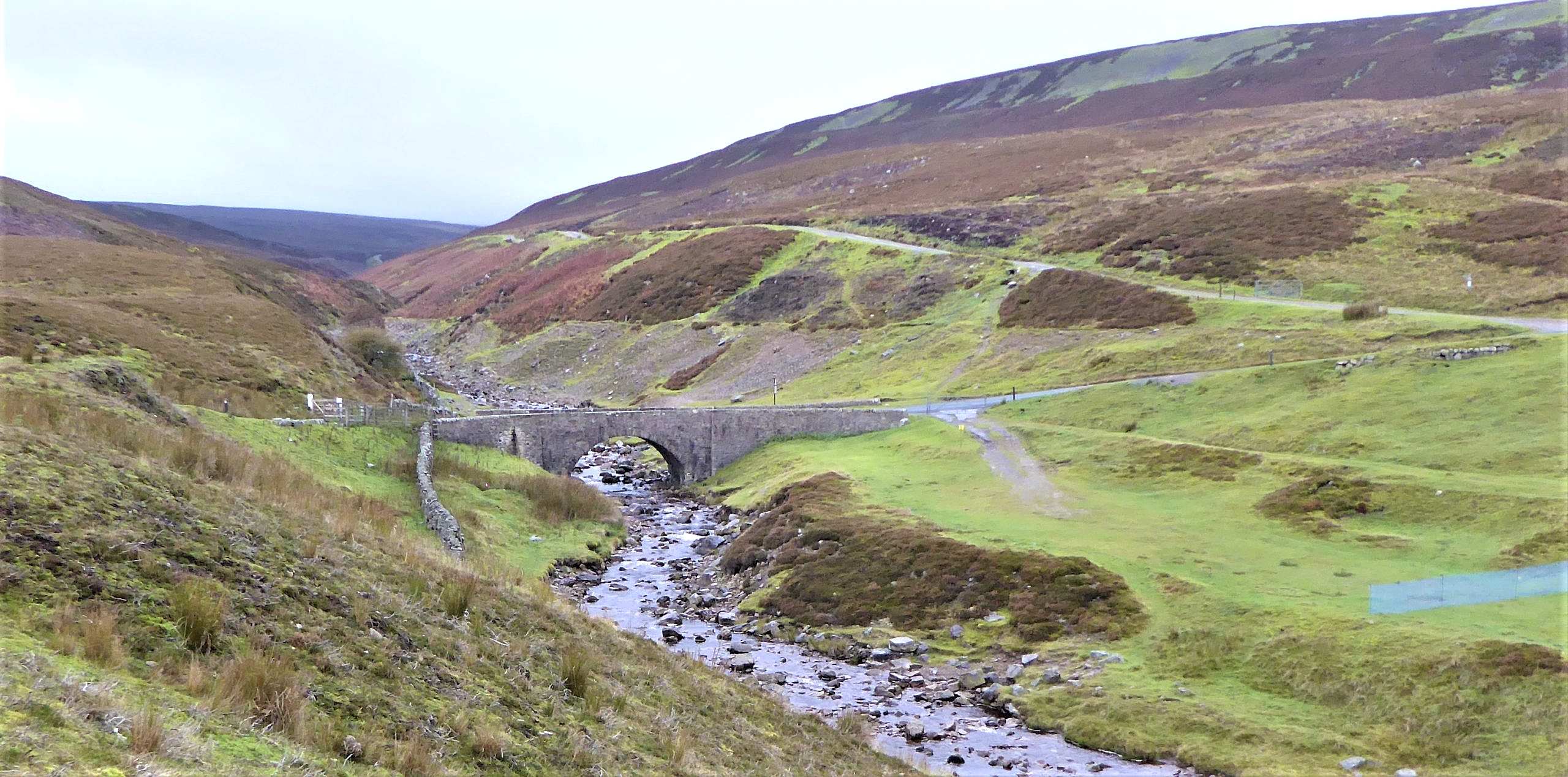 The image shows Surrender Bridge in Swaledale in the Yorkshire Dales which was a major filming spot in Wuthering Heights.